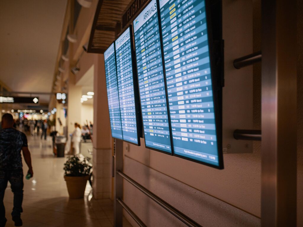 Airline flight schedules on flat screen televisions 1716825